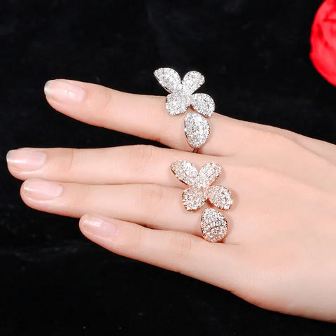 ThreeGraces Shiny Cubic Zirconia Micro Pave Flower Cuff