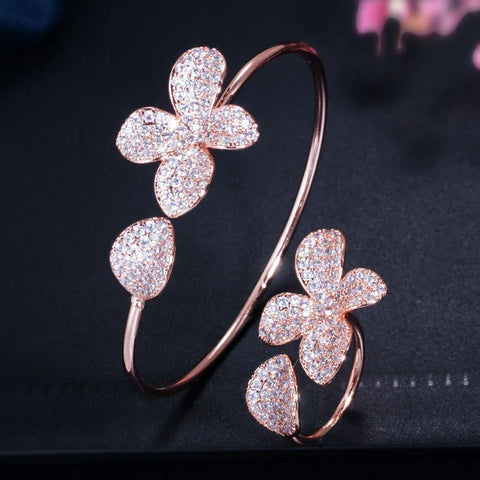 ThreeGraces Shiny Cubic Zirconia Micro Pave Flower Cuff