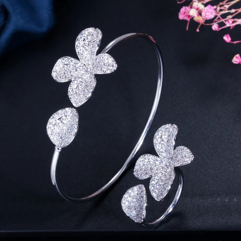 ThreeGraces Shiny Cubic Zirconia Micro Pave Flower Cuff