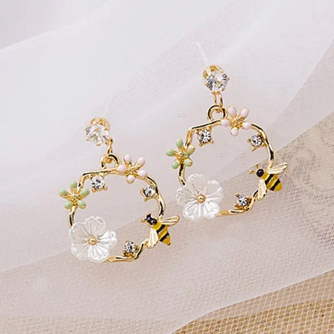 Flower Butterfly Stud: Bling Crystal Studs.