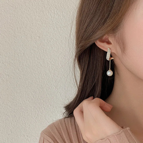 Imitation Pearl Dangle: Faux Pearl Drops.