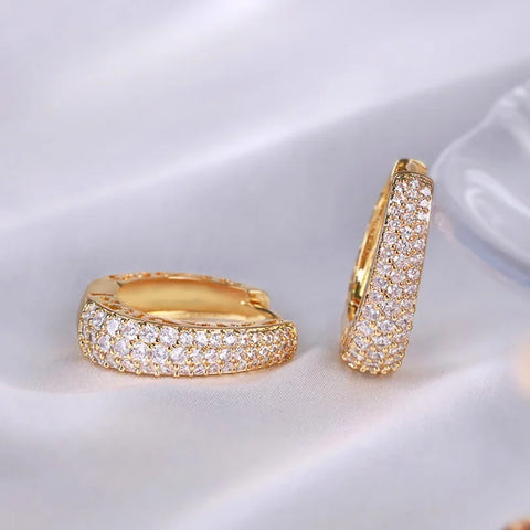 RAKOL Hollow Hoop: Dazzling CZ Hoops.