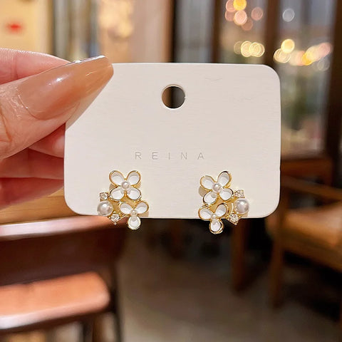 Zircon Butterfly Earrings: Golden Zircon Butterfly.