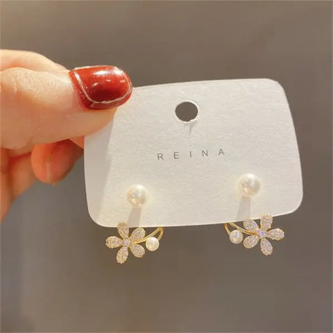 Flower Butterfly Stud: Bling Crystal Studs.