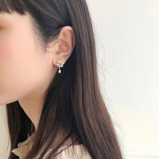 Flower Butterfly Stud: Bling Crystal Studs.
